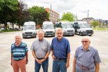 Citizen buses with the drivers Four men stand in front of the four community buses in Kevelaer.