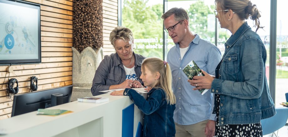 People in the information building of the brine garden